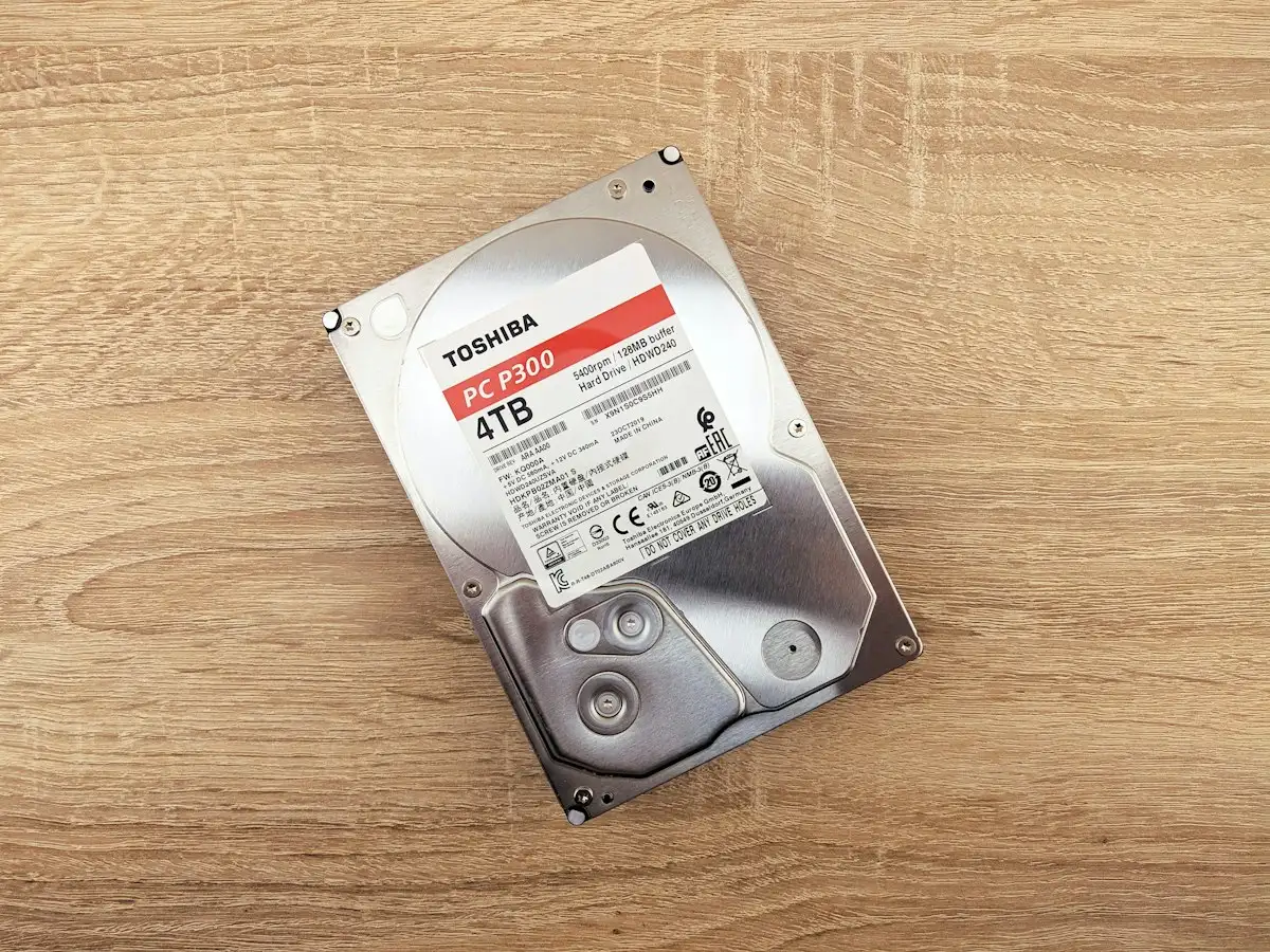 A 4 TB hard drive on a desk, the kind of disk that can carry a first offsite Proxmox Backup Server copy